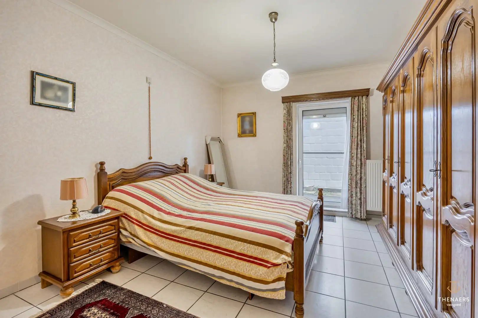 Rustig gelegen appartement met 2 slaapkamers en 2 terrassen nabij het dorpsplein van Brustem. foto 15