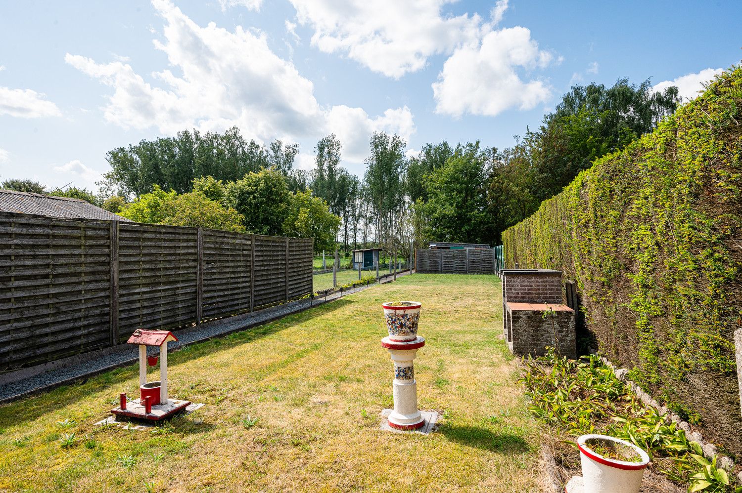 Verrassend ruime woning met prachtig zuidgerichte tuin in het Mandeweegsken! foto 12