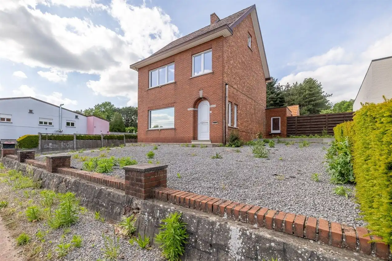 Karaktervolle woning met grote tuin, bijgebouwen en uitbreidbaar zoldervolume op een verrassend diep perceel foto 6