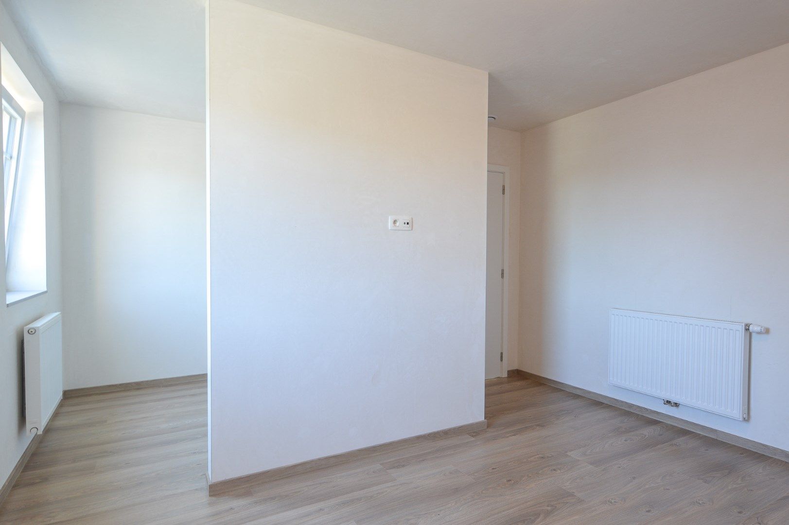 Halfopen nieuwbouwwoning te huur in Roksem.  foto 12