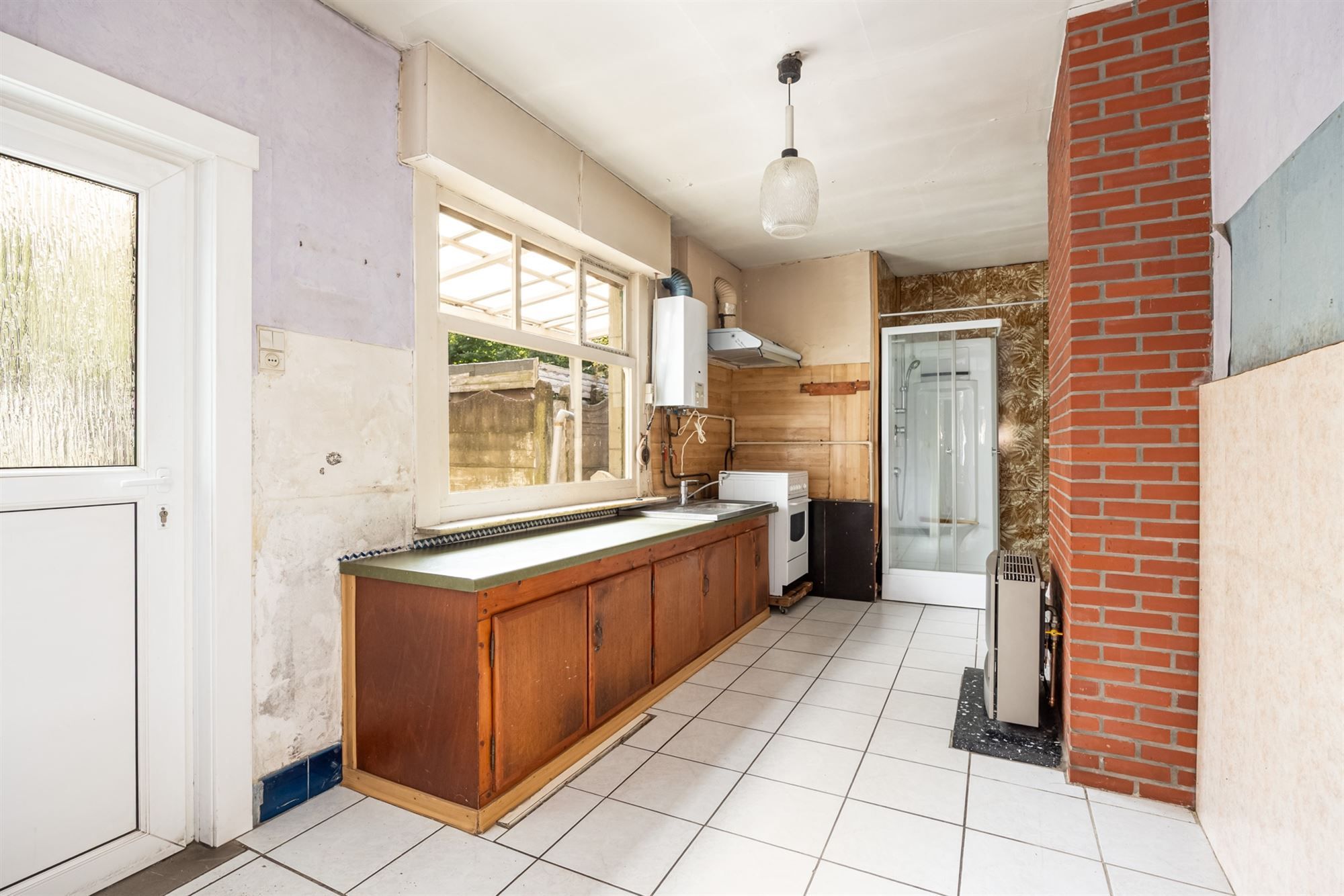 Te renoveren woning met opslagruimte in Mechelen foto 8