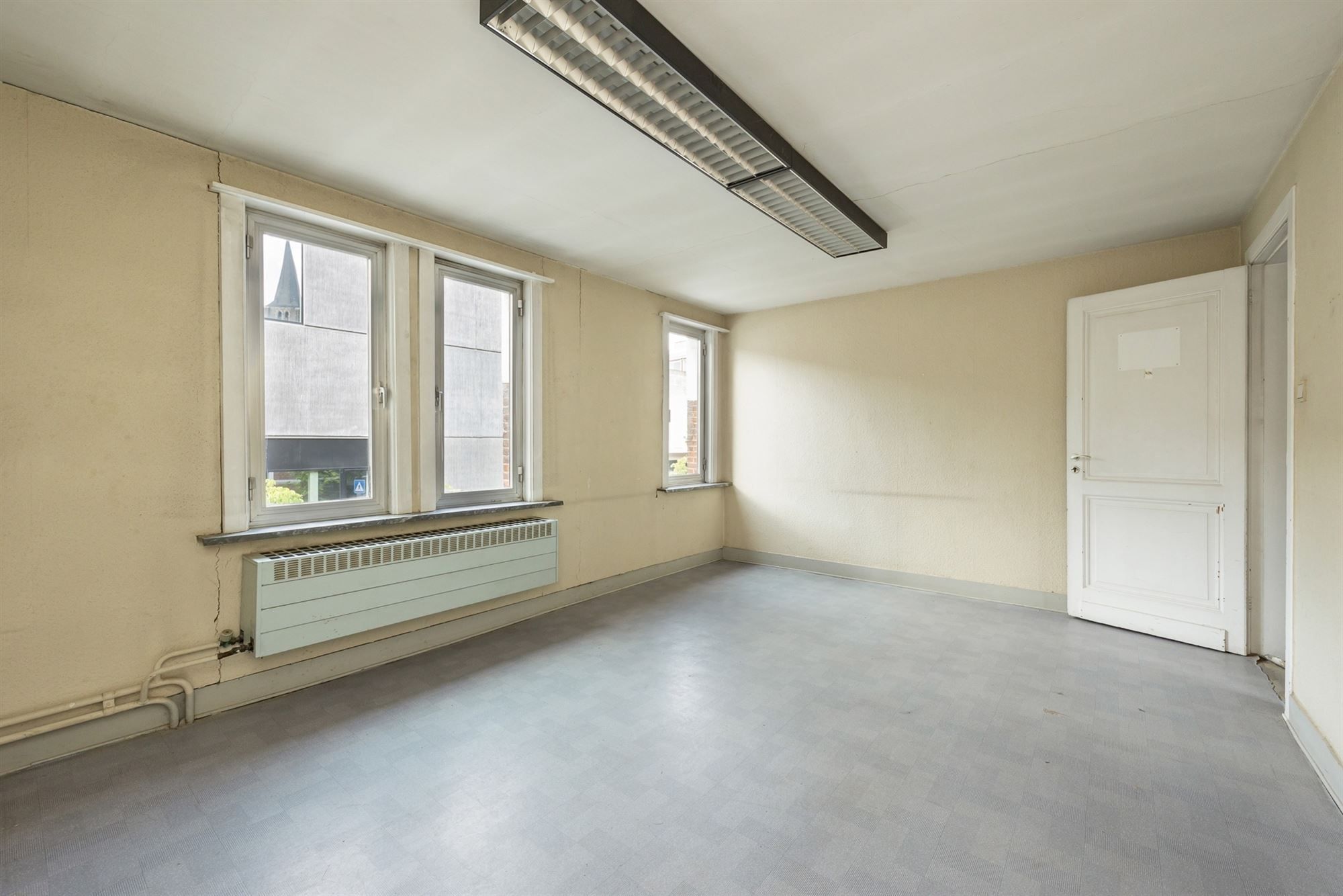 Gunstig gelegen renovatiewoning met 2 tot 4 slaapkamers foto 8