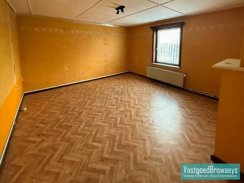 Centraal gelegen basiswoning met tuin en parkeergelegenheid foto 19