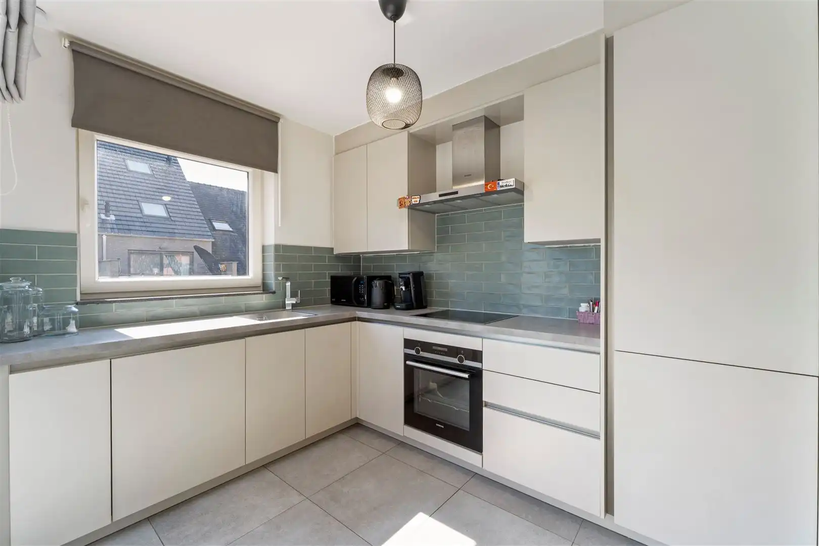 TE KOOP: Recent 2-slaapkamerappartement in het centrum van Heusden! foto 7