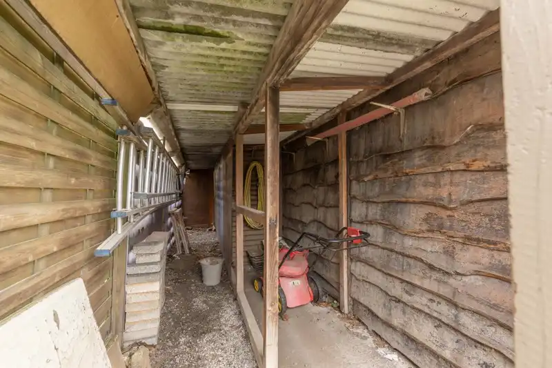 Te renoveren, rustige gelegen halfopen woning met 3 slaapkamers, garage en tuin te koop in Sint-Baafs-Vijve! foto 27