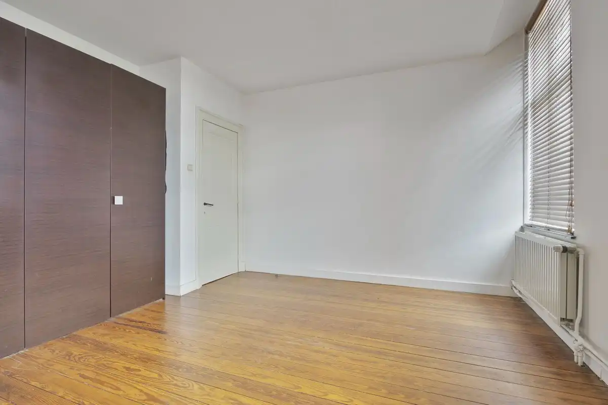 Karaktervol hoekpand met woning en appartement in Riemst foto 14