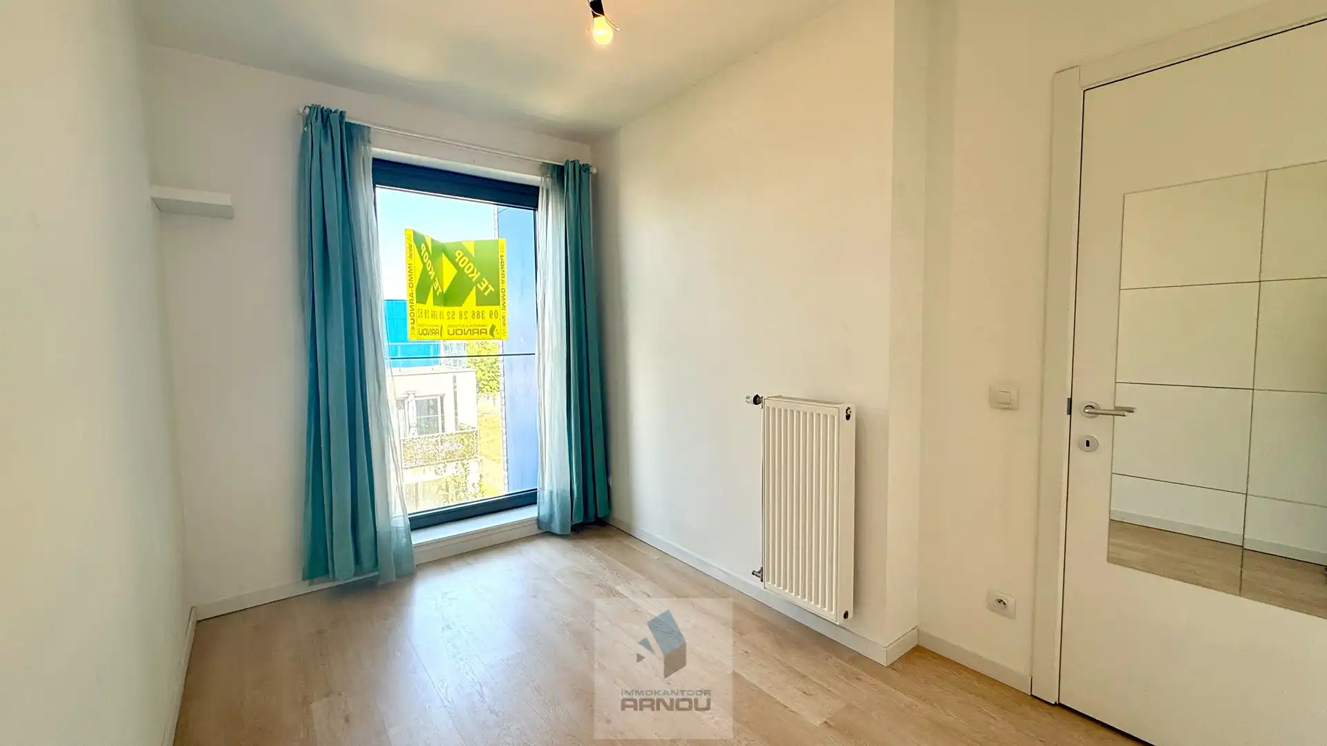 Wonen aan de Leie: 2-slaapkamerappartement in hartje Deinze foto 12