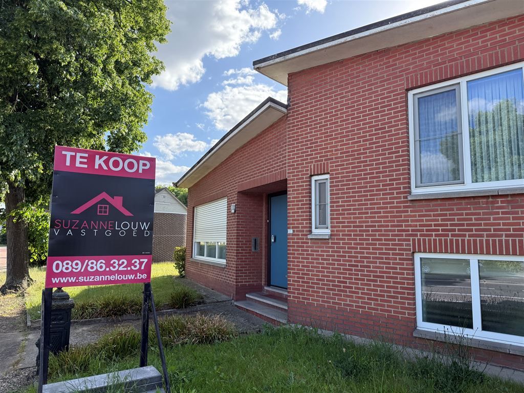 Vrijstaande splitlevel woning, te renoveren naar eigen smaak foto 2