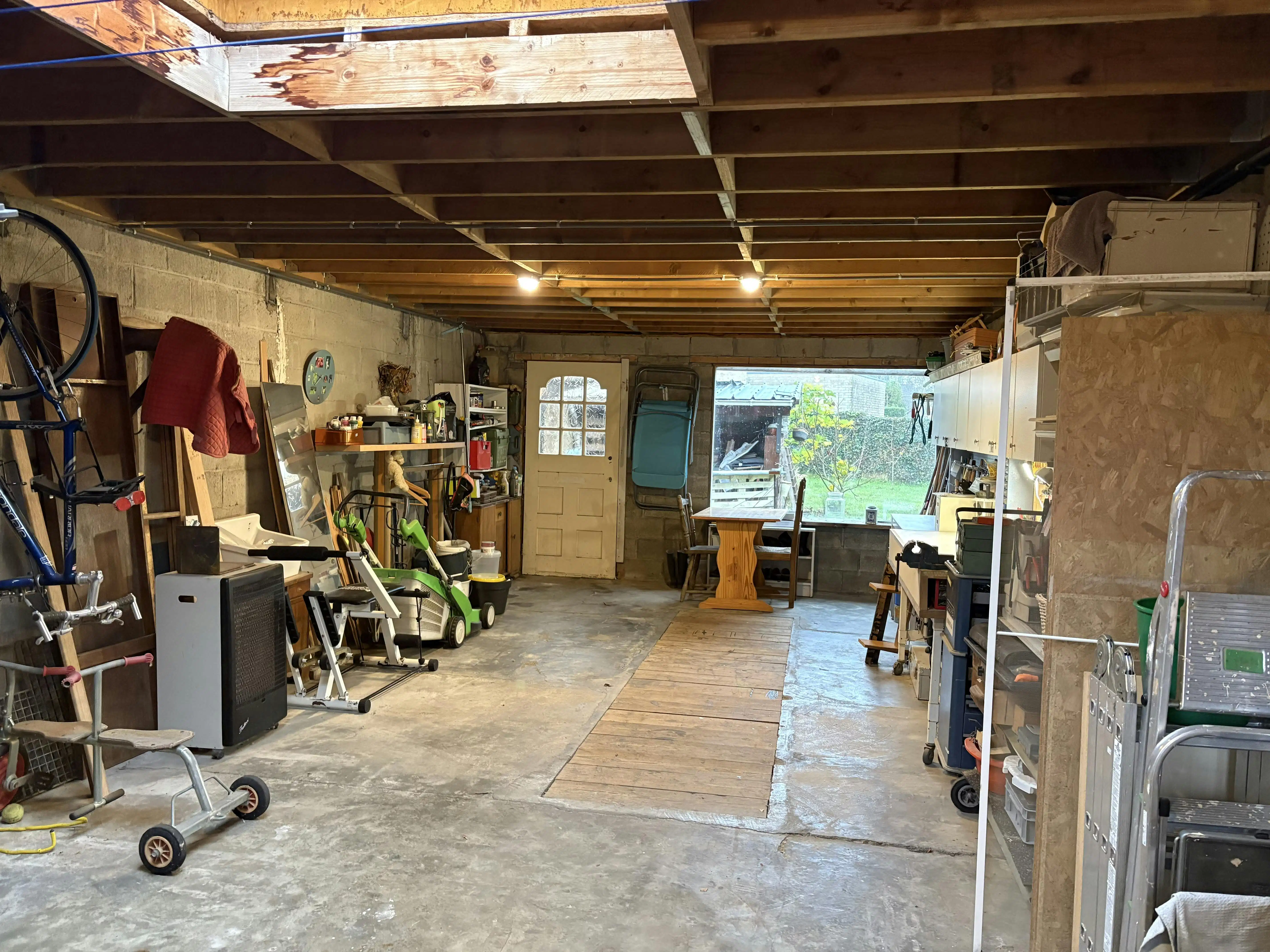 Woning met magazijn en 70 m² polyvalente ruimte in Dilsen foto 21