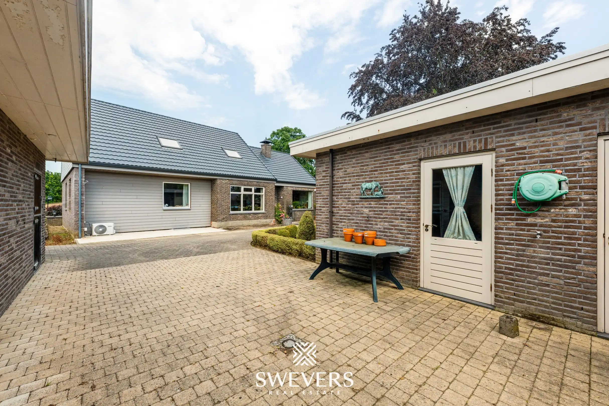 Uniek gerenoveerde hoeve op 6.661 m² met zes slaapkamers, loods en volledige paardeninfrastructuur foto 34