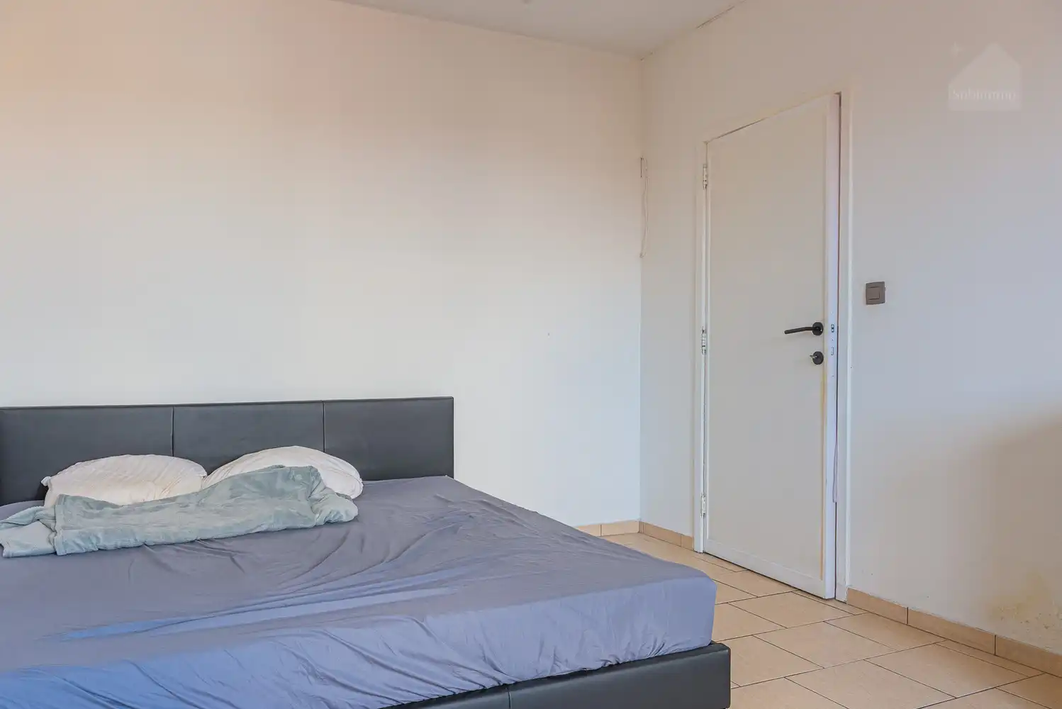 Ruim en instapklaar appartement met 2 slaapkamers, garage en centrale ligging in Tessenderlo foto 8