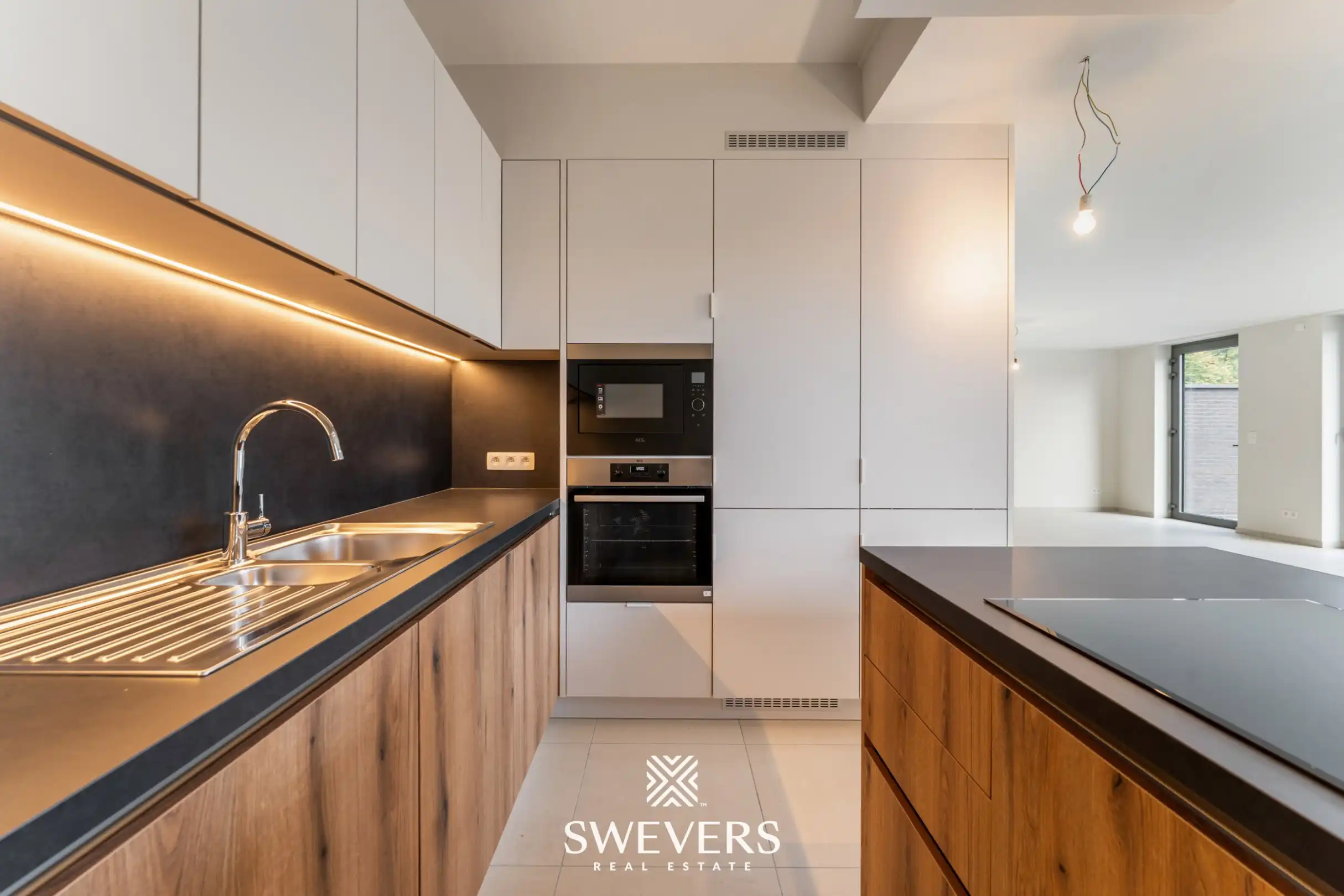 Stijlvol, gelijkvloers en instapklaar appartement (208 m²) mét private tuin en private kelder vlakbij Zolder-centrum foto 10