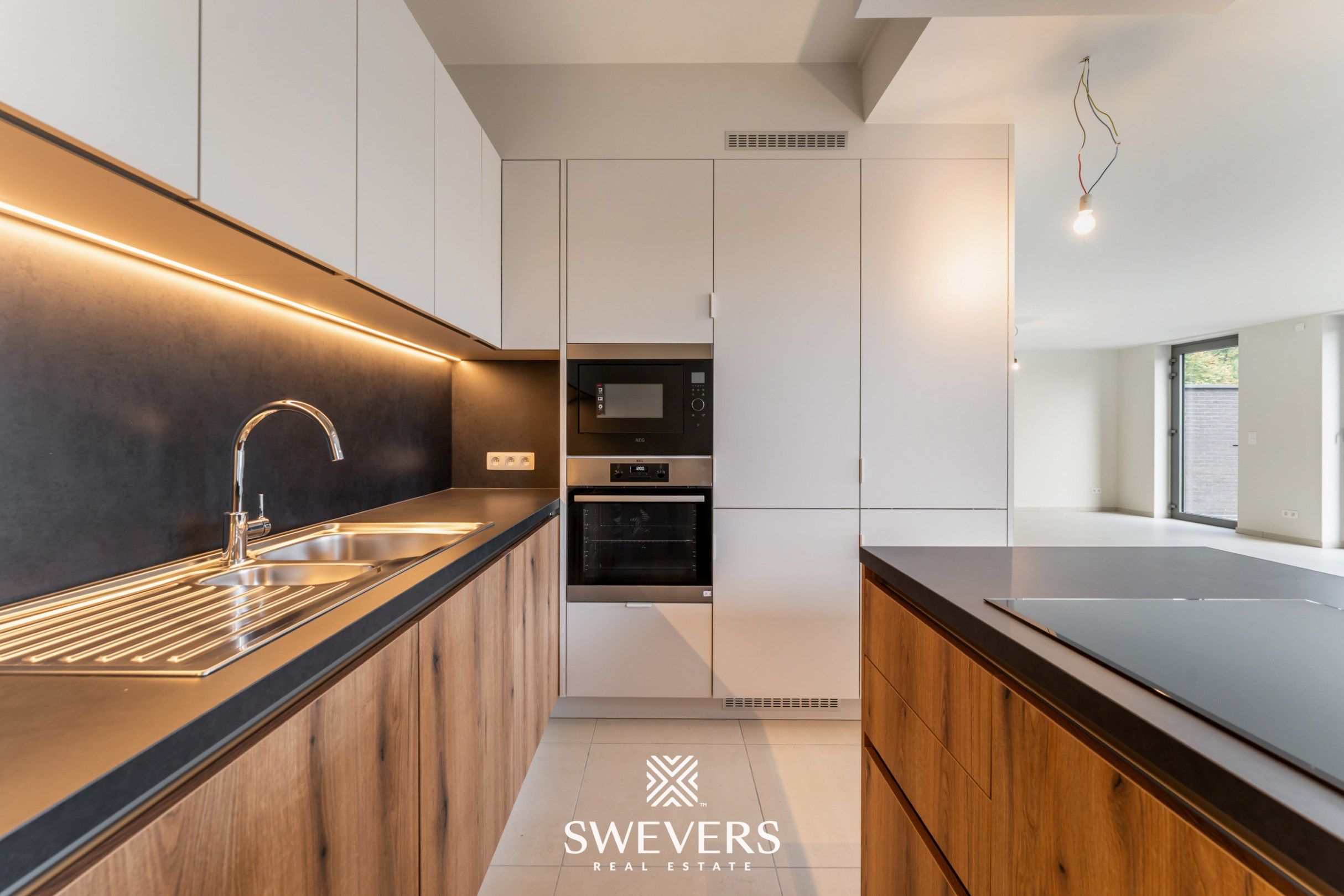 Stijlvol, gelijkvloers en instapklaar appartement (208 m²) mét private tuin en private kelder vlakbij Zolder-centrum foto 10