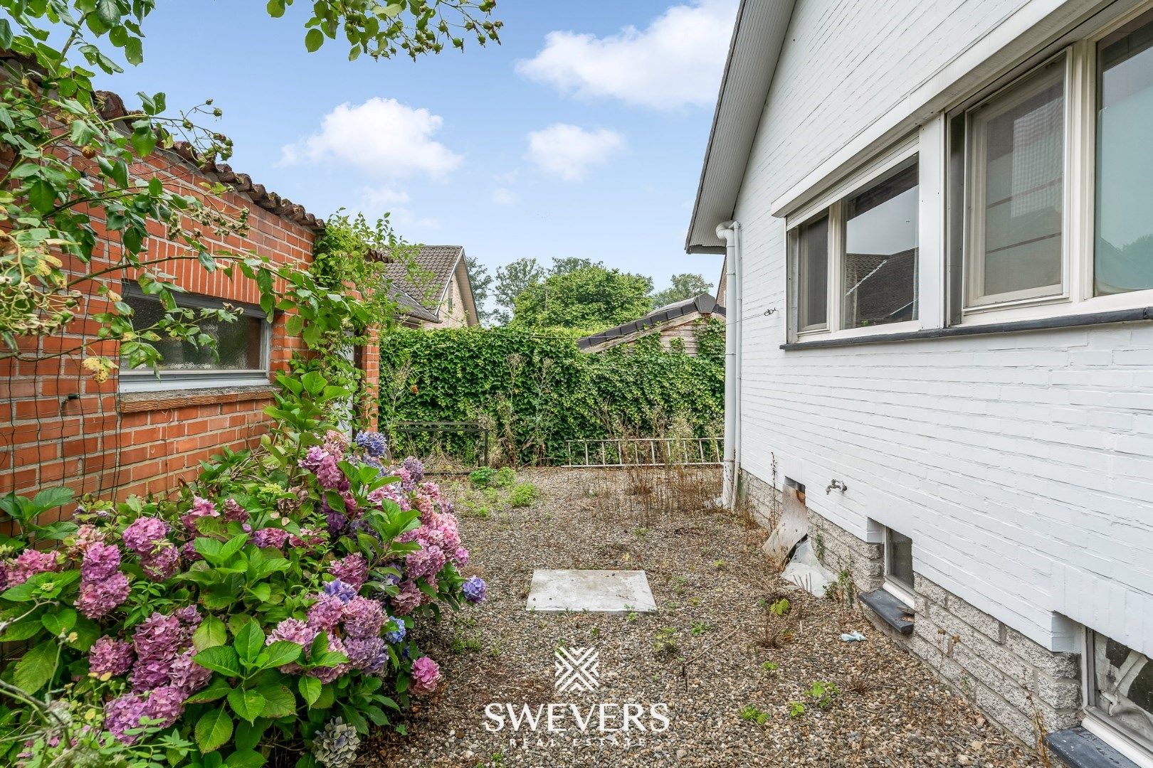 Solide woning met 6 slpk en veel potentieel op 8a 86ca omgeven door groen in Genk foto 30