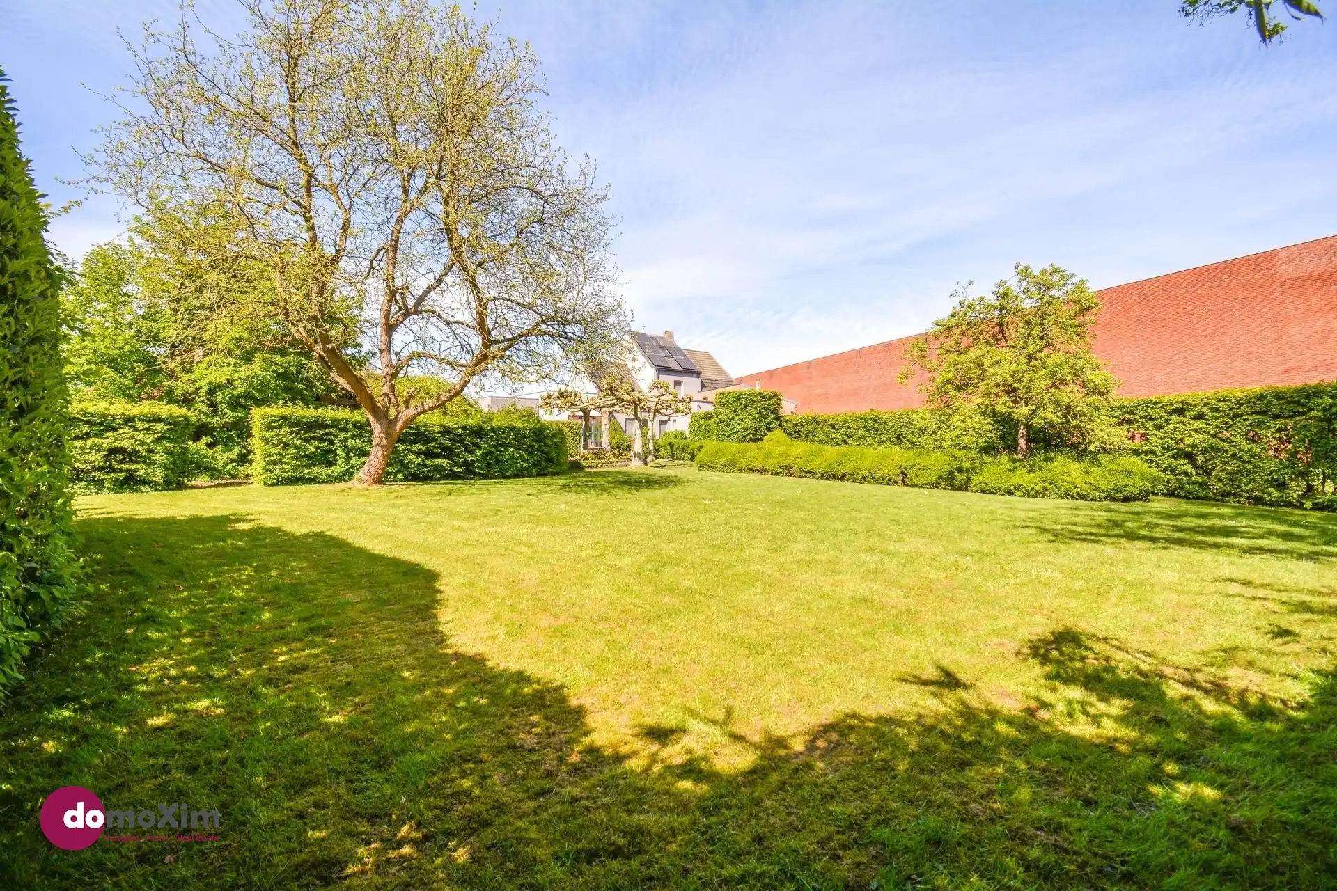 Charmante halfopen bebouwing met prachtige tuin en topligging aan de vaart foto 34