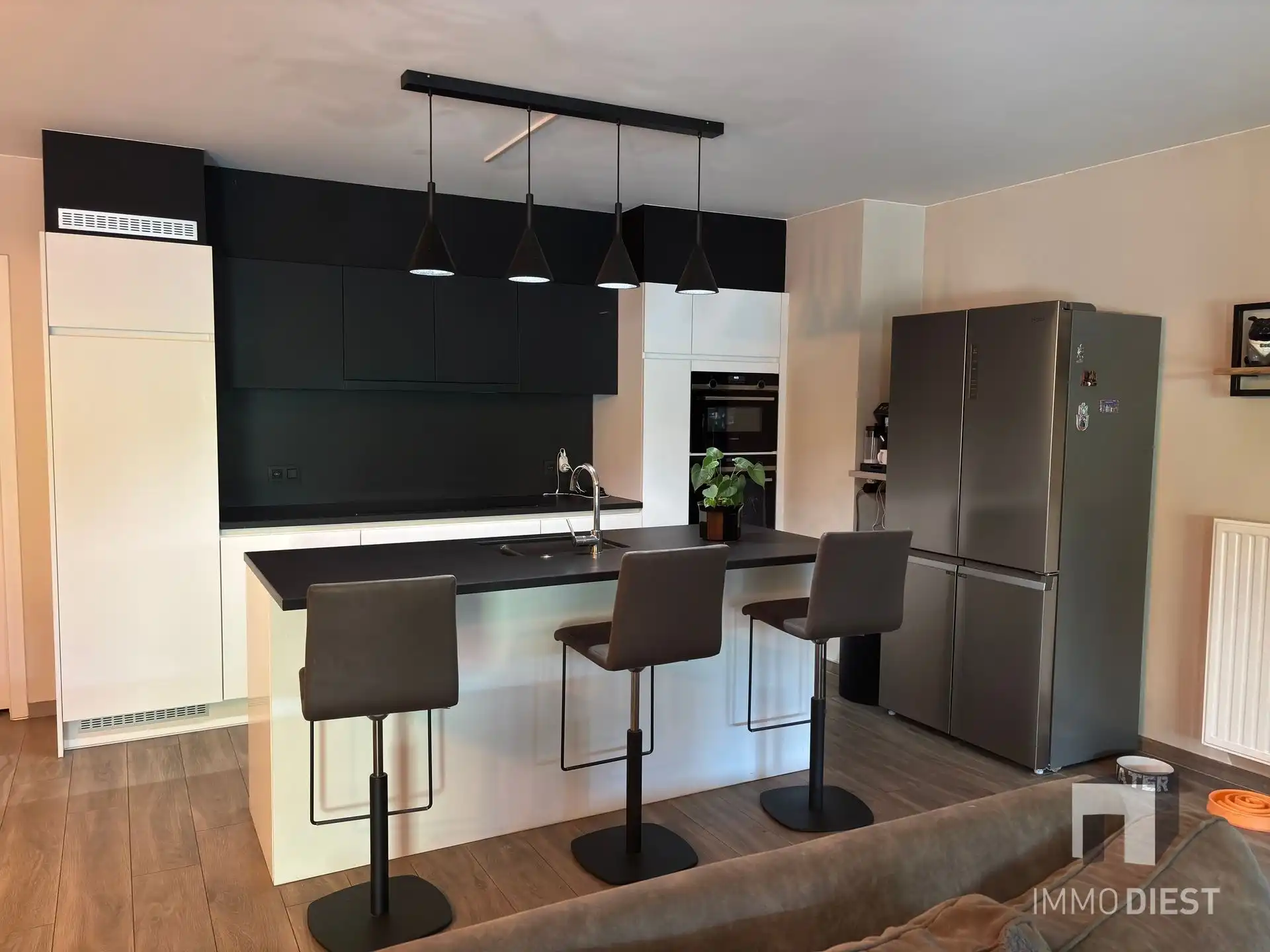 Ruim gelijkvloers appartement met open leefruimte en zonnige tuin foto 28
