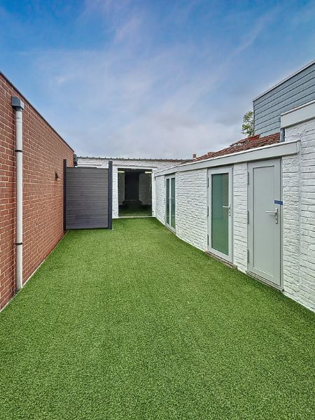 Knusse rijwoning foto 18