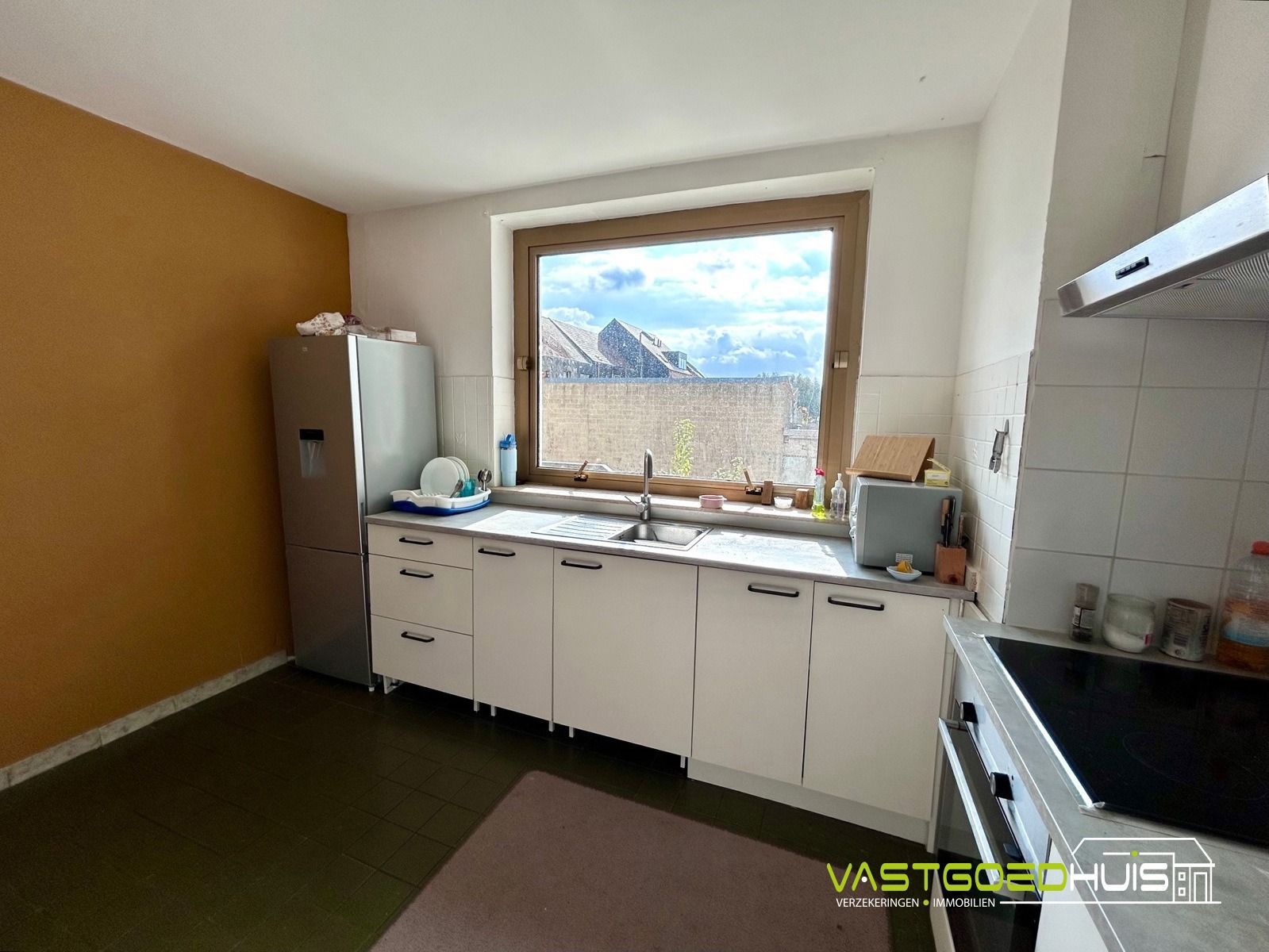 Ruim, gelijkvloers appartement met terras foto 11