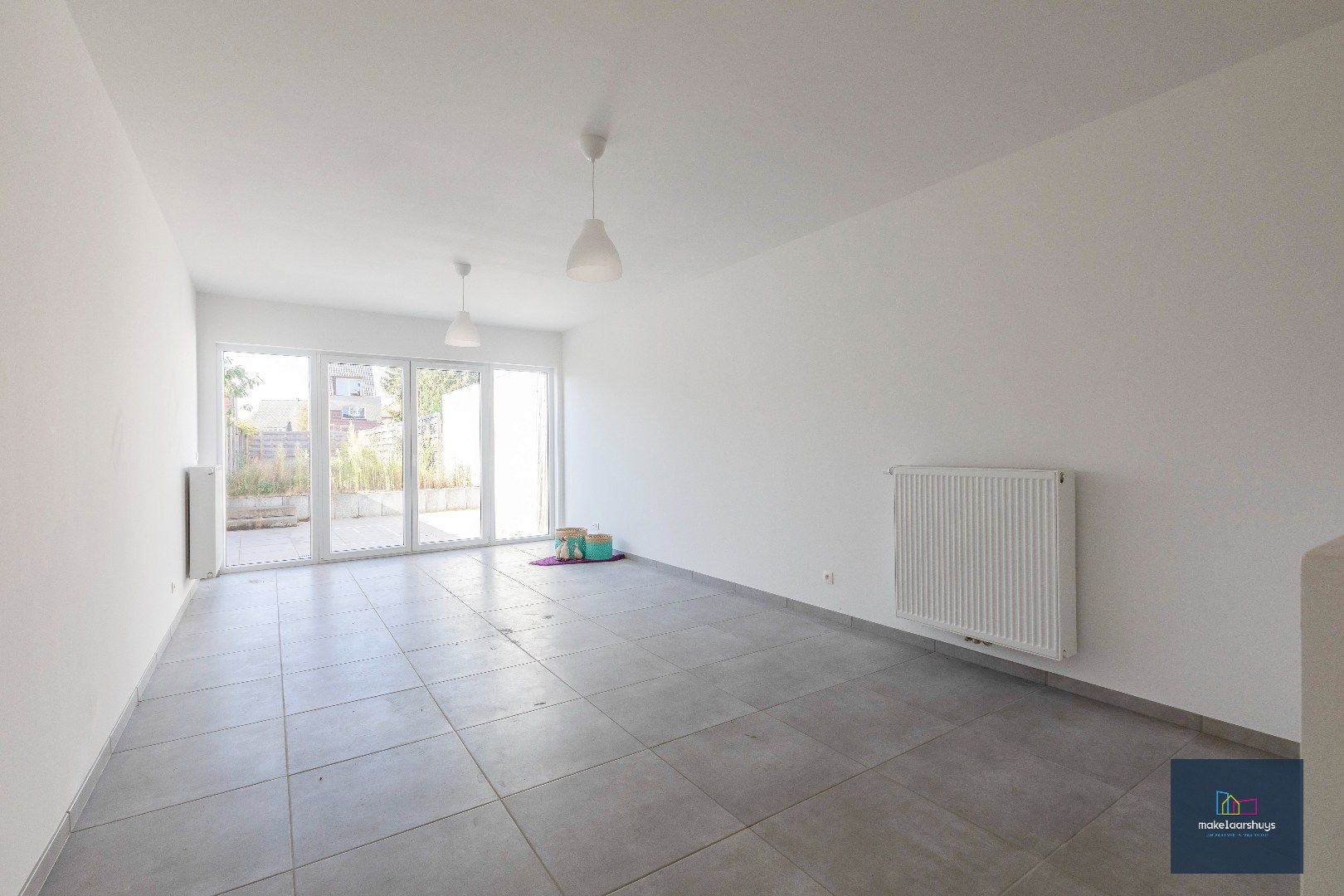 Instapklare energiezuinige woning met 3slpk tuin en staanplaats foto 5