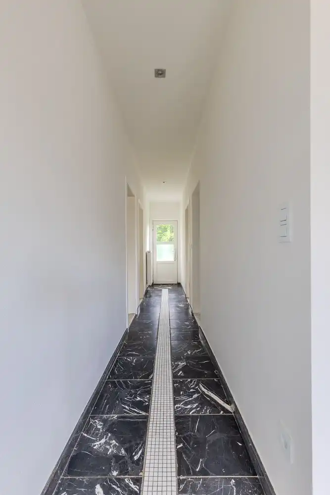 Instapklare woning op een ruim perceel van circa 8a8ca met tuin en garage op een gunstige locatie. foto 17