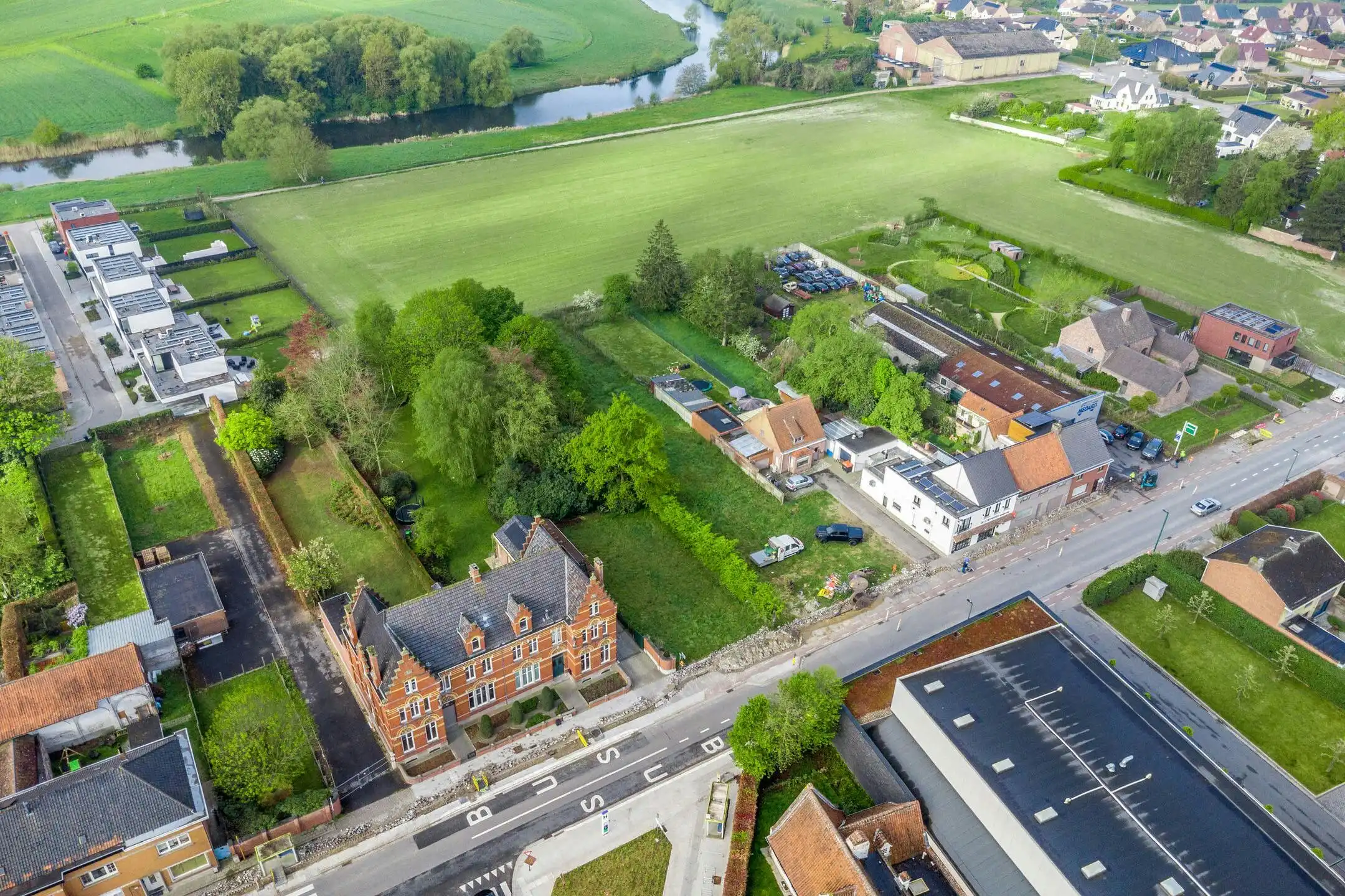 Ruim stuk bouwgrond te koop nabij centrum Sint-Baafs-Vijve foto 6