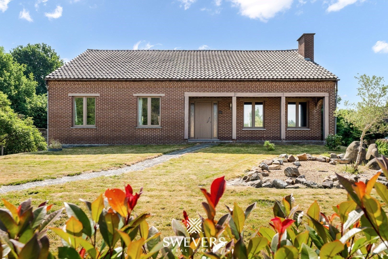 Ruime gezinswoning met zonnepanelen, kelder en zonnige tuin op topligging foto 32