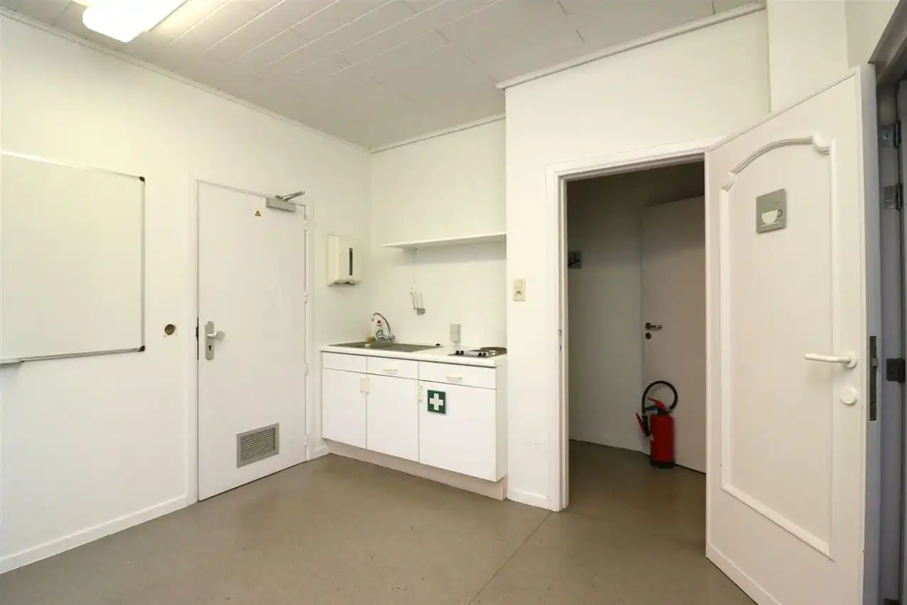 Opbrengsteigendom (handel & 4 app) op toplocatie foto 22