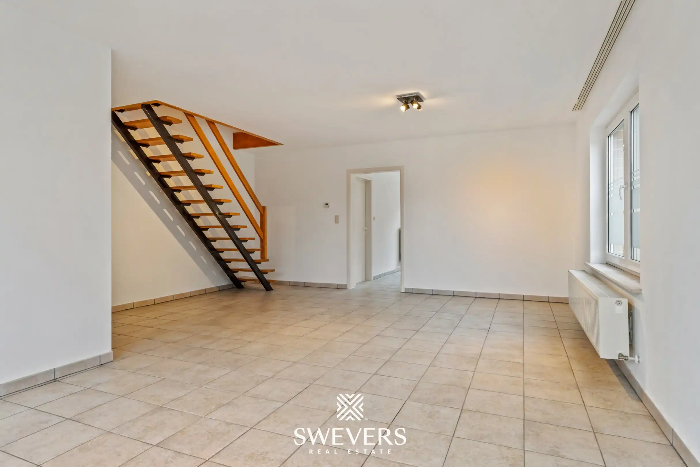 Ruim duplex appartement met 2 slaapkamers, terras en garage in Heusden-Zolder foto 3