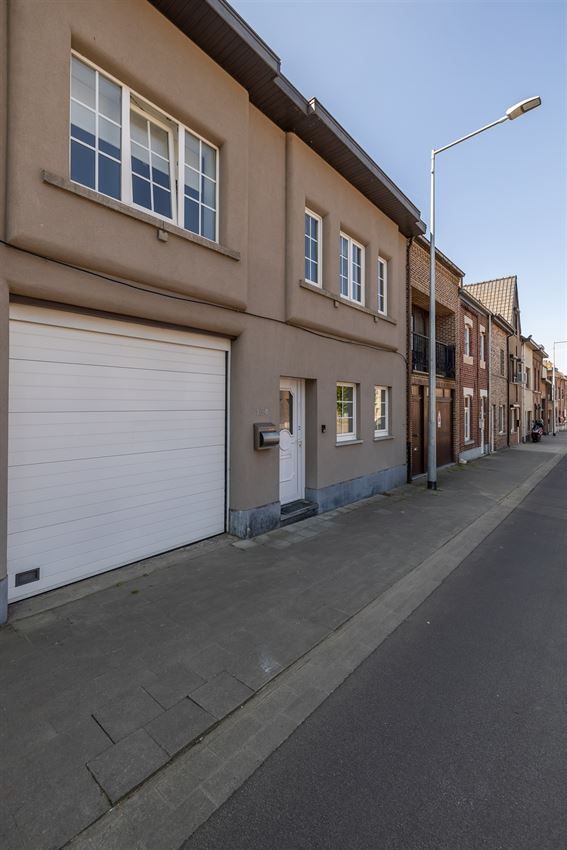 Stadswoning met 3 slpk., tuin en garage foto 32