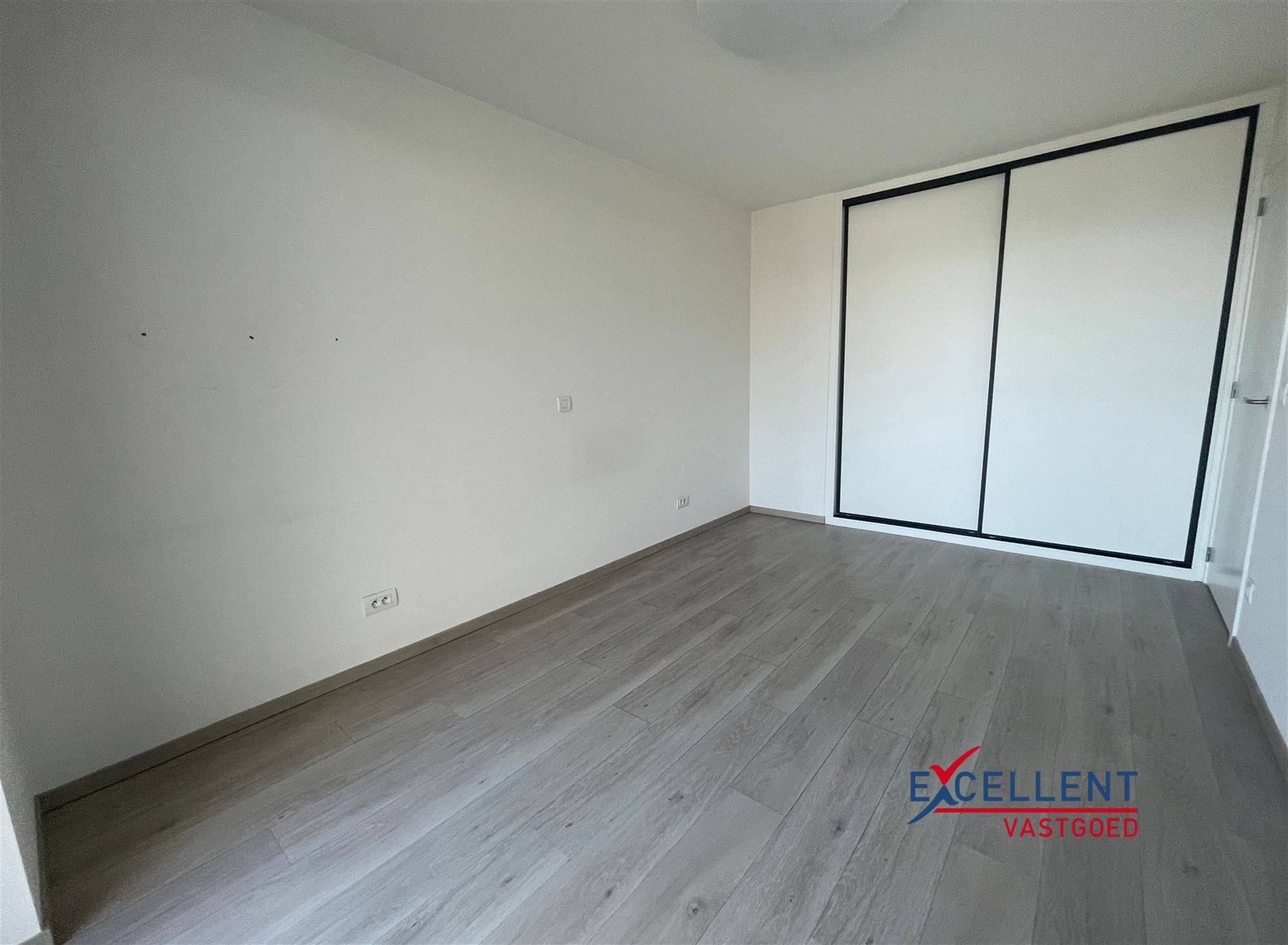 Nieuwbouwappartement centrum Deinze met twee slaapkamers te huur foto 9