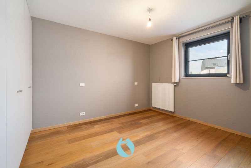 Deze woning is rustig gelegen in woonerf Brielken te Evergem foto 8