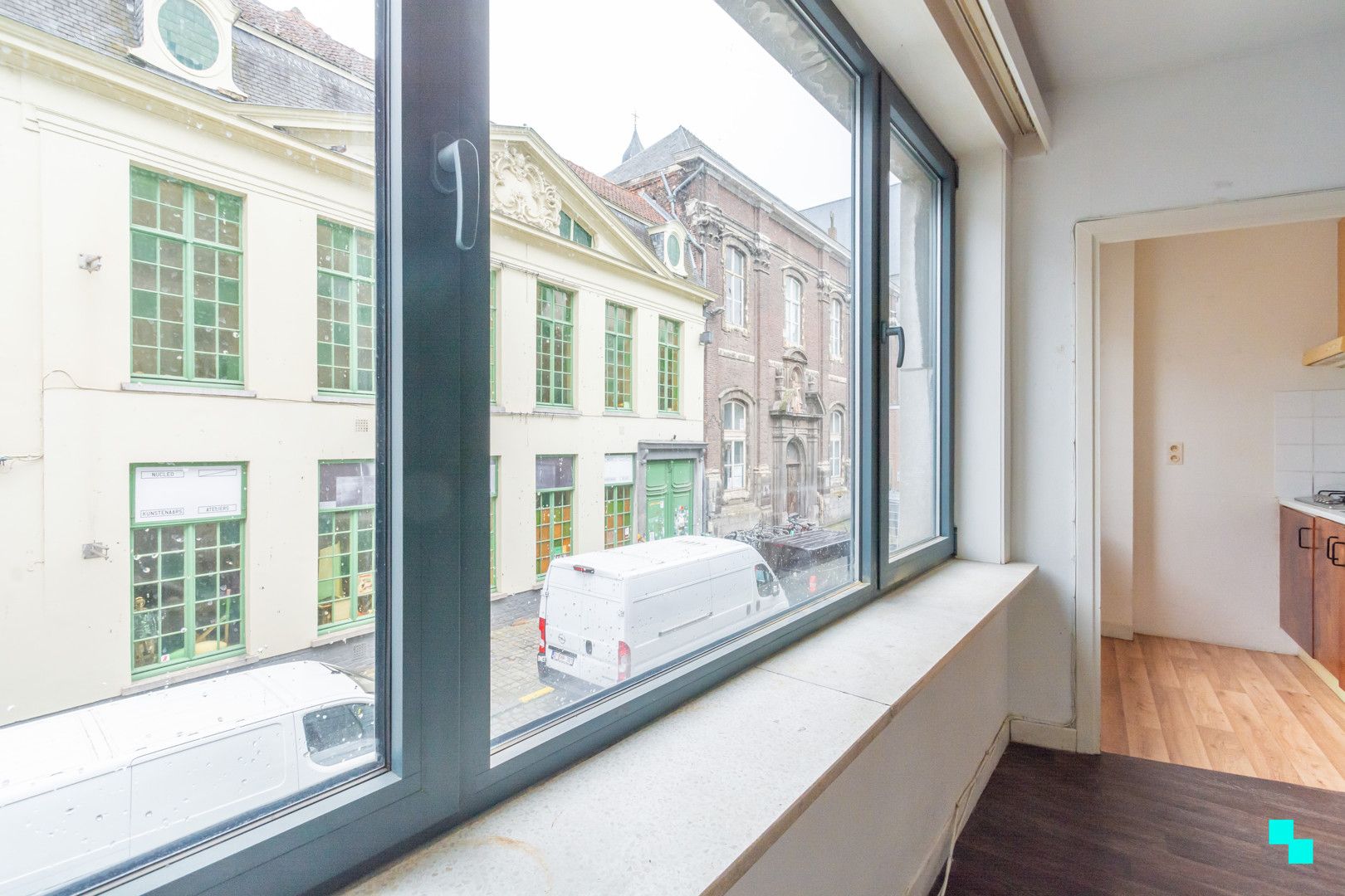 Appartementsgebouw met 3 appartementen en handelszaak nabij Patershol foto 1