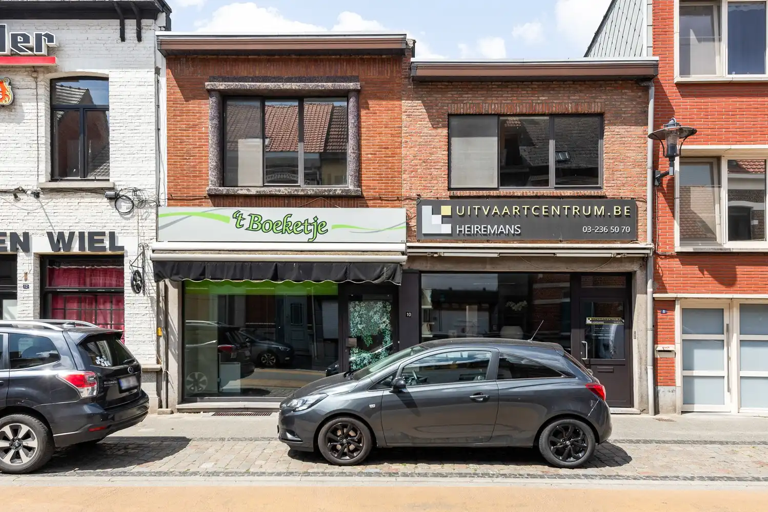 Handelshuis met 2 handelsruimtes en appartement in het hart van Wommelgem. foto 27