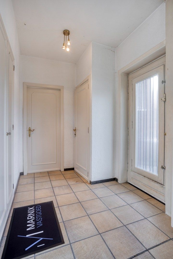 Te renoveren halfopen bebouwing in Kessel-Lo met 4 slaapkamers en garage - 202 m² foto 2