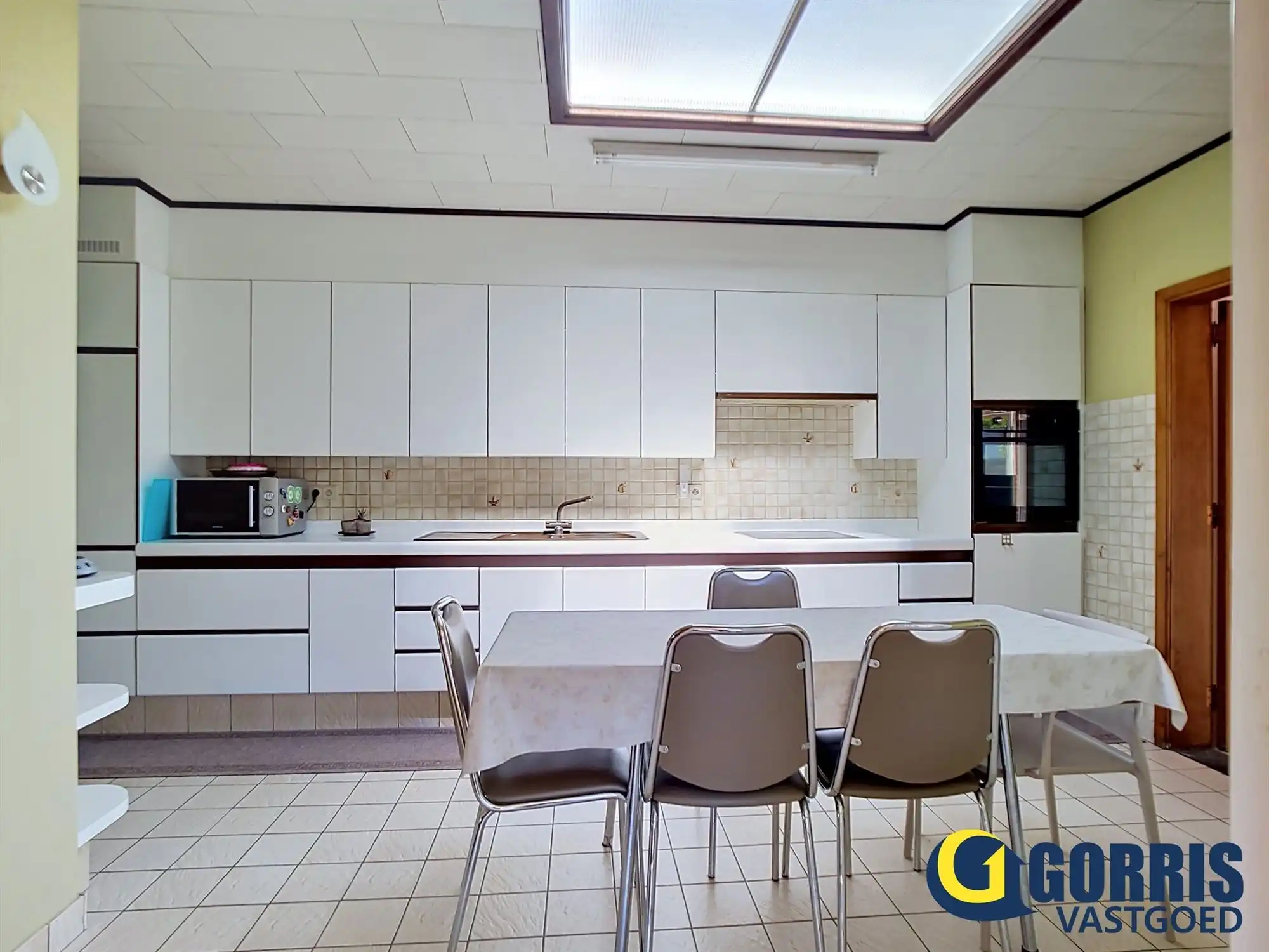 Ontdek deze ruime woning met centrale ligging in het centrum van Heist-op-den-Berg! foto 8