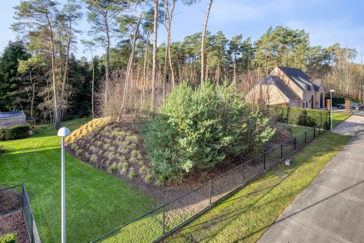 Ruim ingedeelde en kwalitatief afgewerkte villa op een mooi perceel met naastgelegen bouwgrond. foto 43