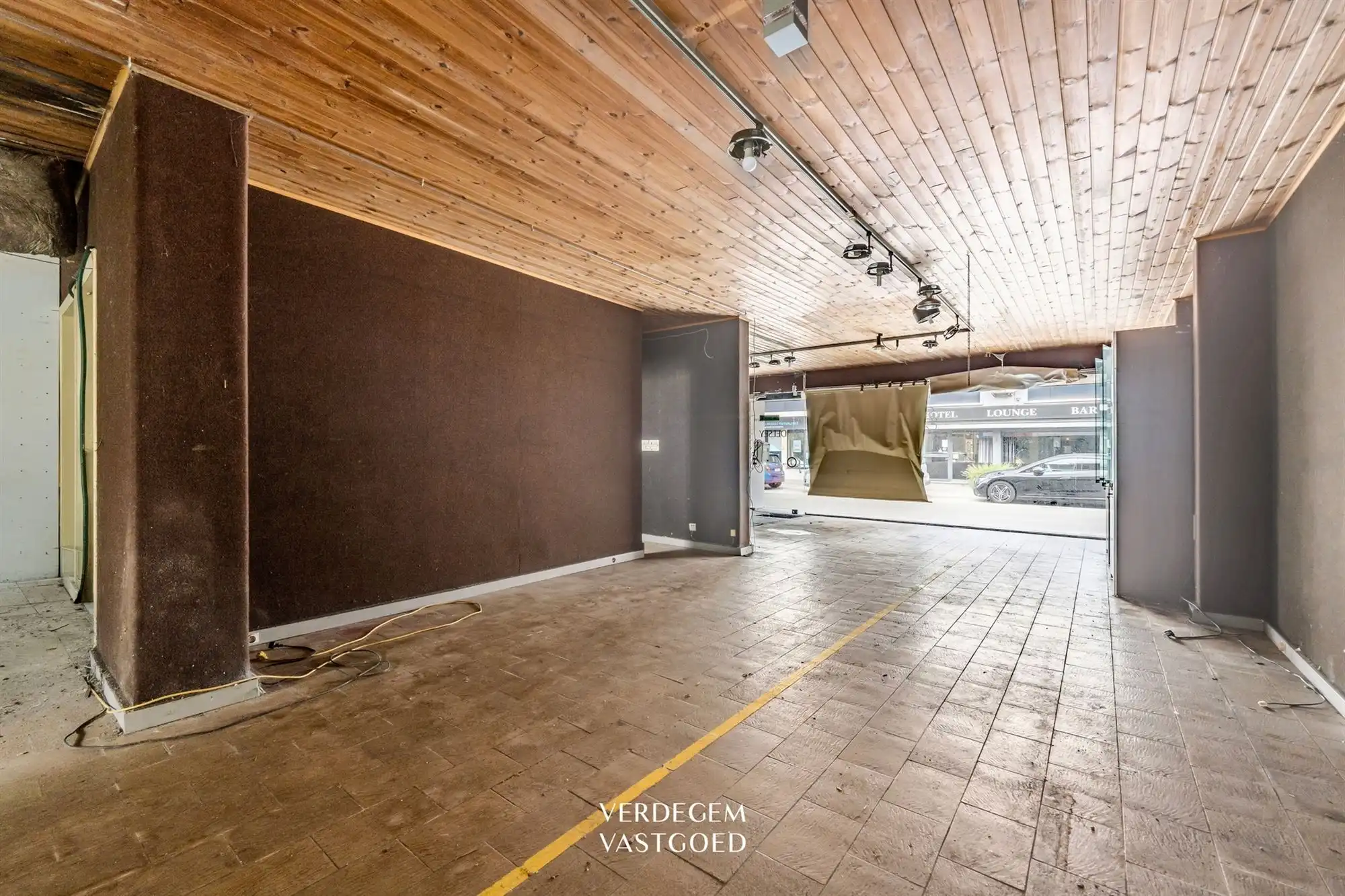 Renovatieproject: centraal gelegen handelspand met woonst en tuin foto 2