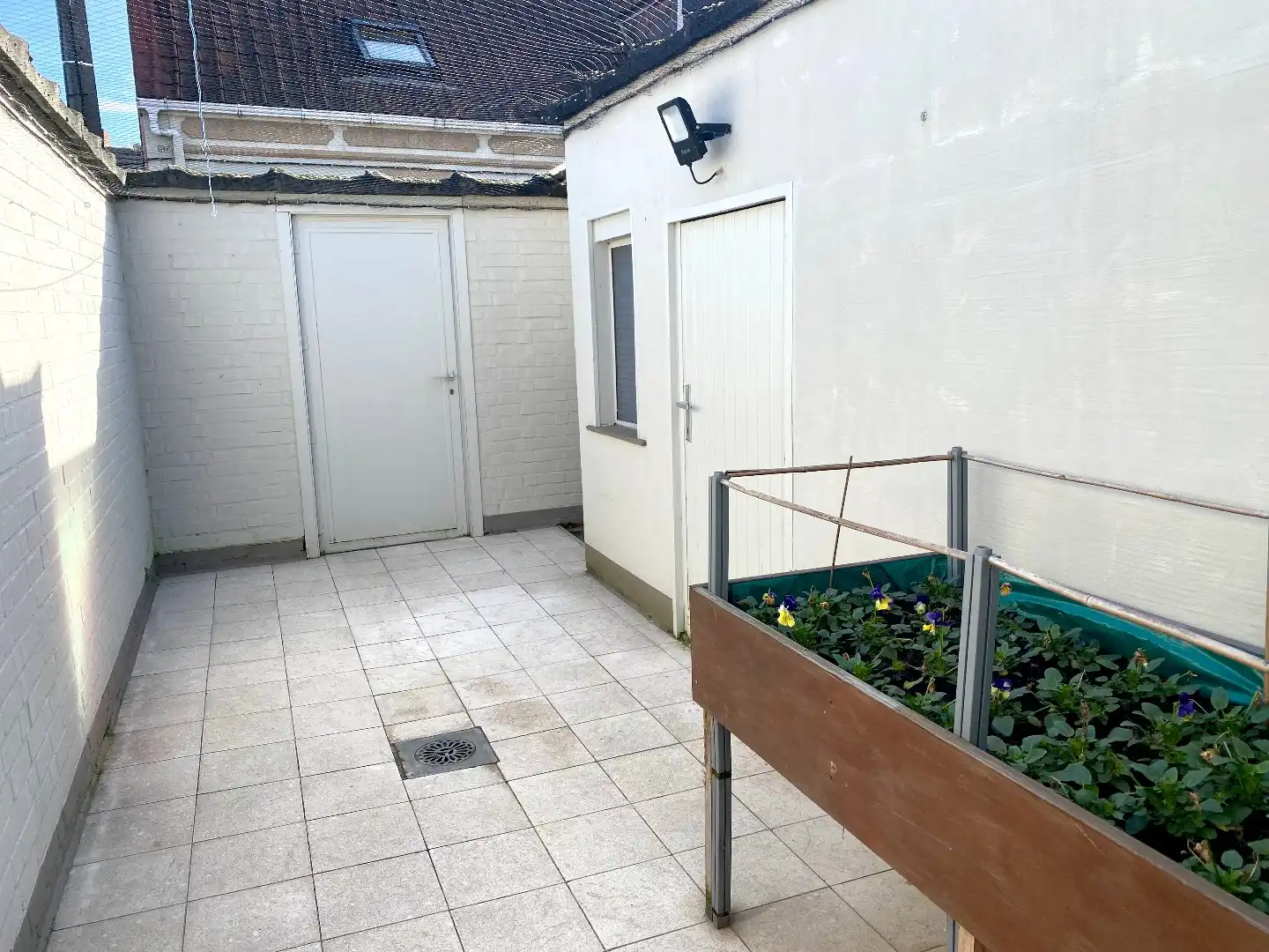 Instapklare rijwoning in het hart van Harelbeke met uitweg voor fietsen foto 20