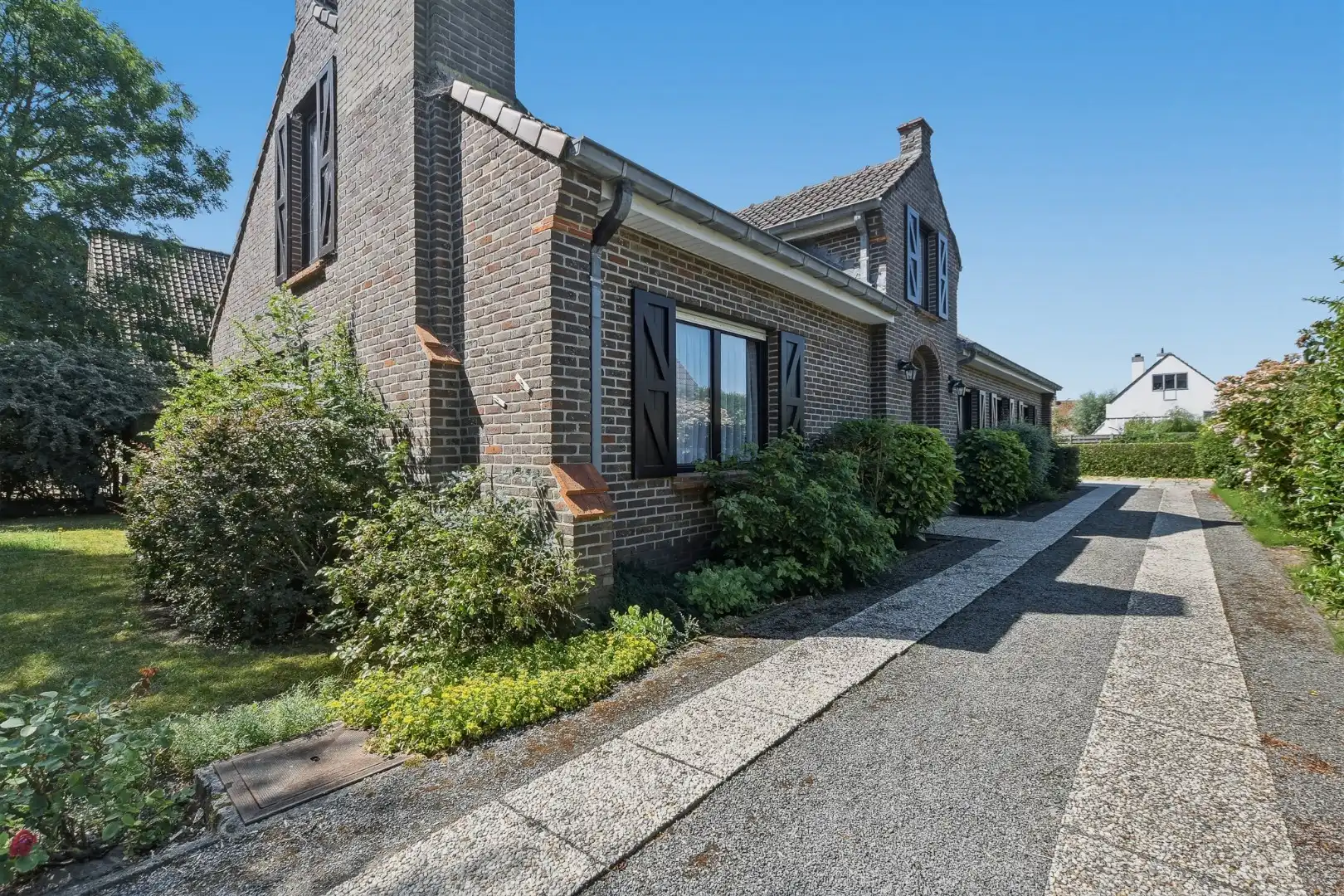 Hoofdfoto van de publicatie: Ruime vrijstaande villa op 765 m² in de gegeerde villawijk Noordhoek te De Haan