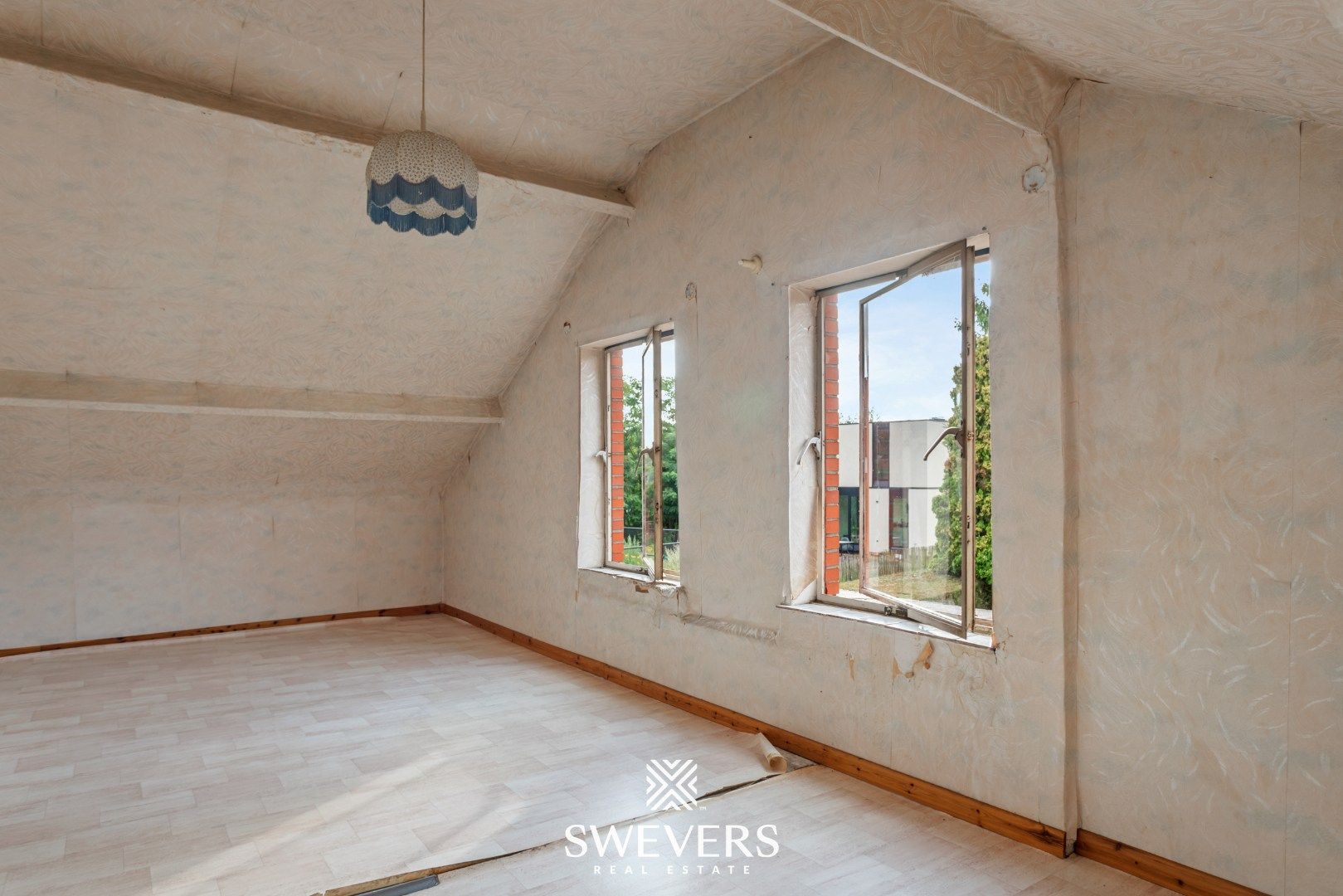 Te renoveren woning met veel potentieel op toplocatie te Diepenbeek foto 16