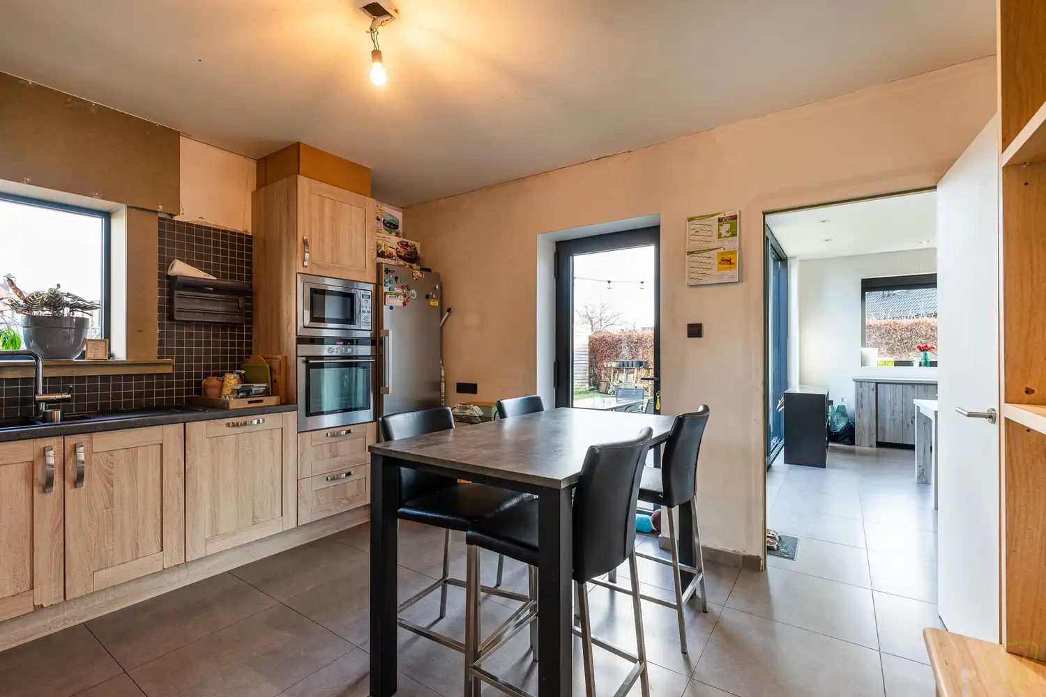 Vernieuwbouw woning met praktijkruimte op topligging met uitstekende zichtbaarheid in Evergem foto 10