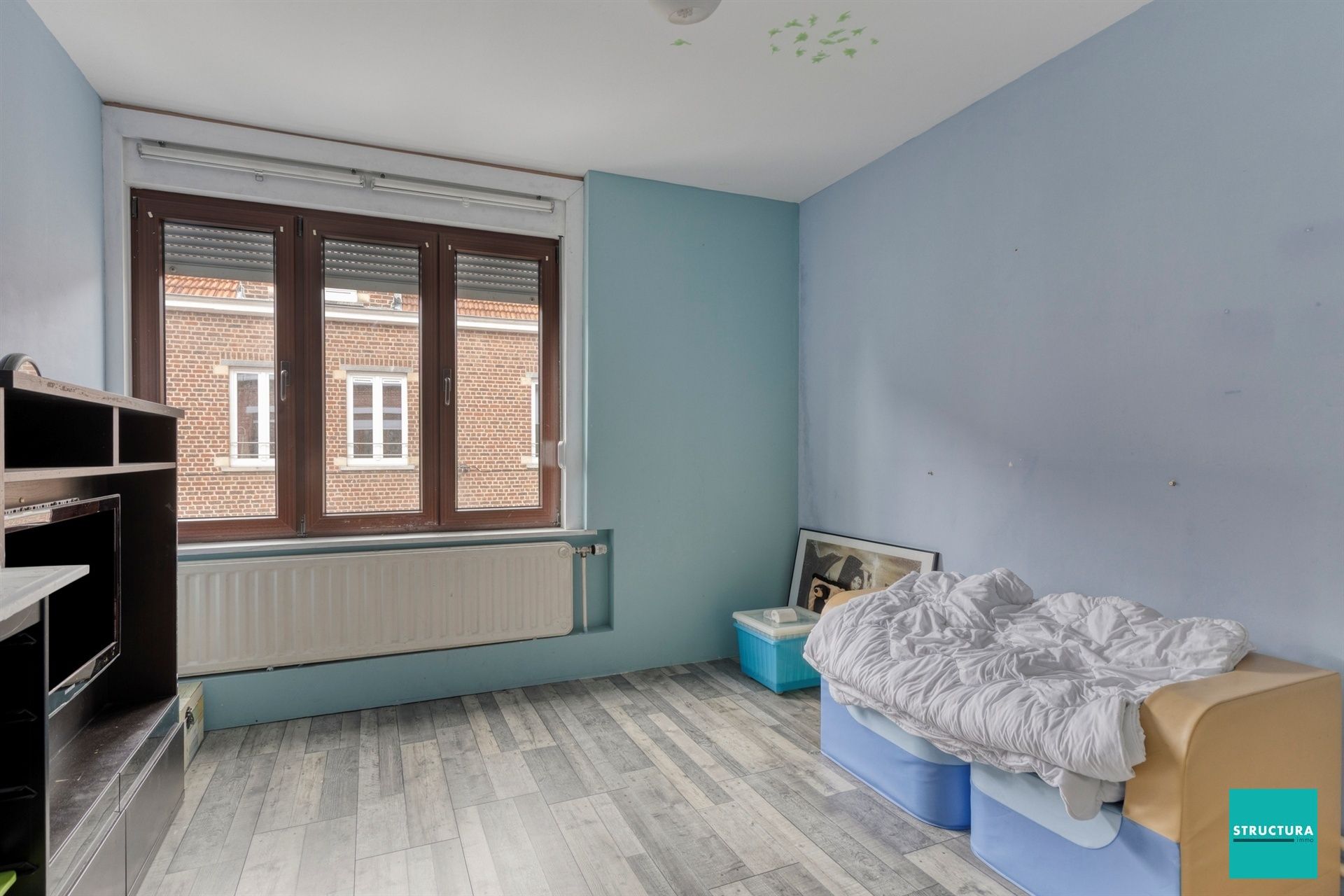 Ruime woning met potentieel in hartje Merchtem
 foto 10