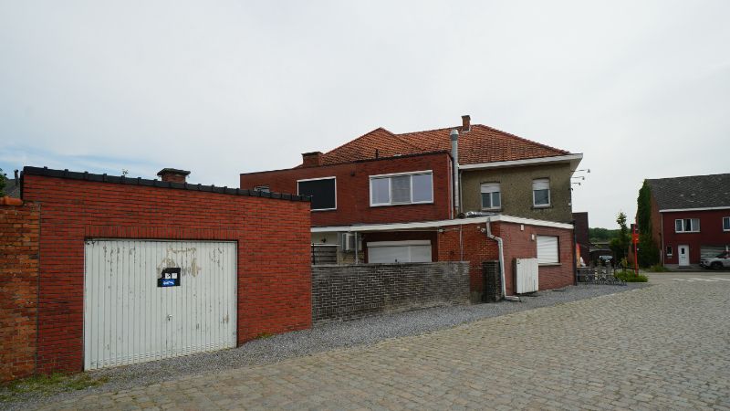 Opbrengsteigendom met 2 verhuurde handelspanden, 1 appartement en 2 garageboxen foto 7