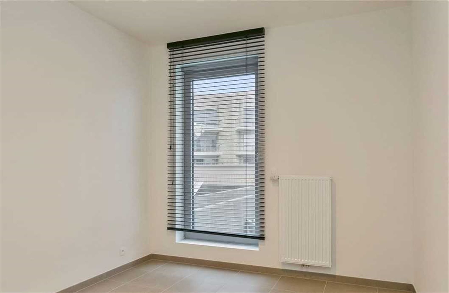 Ruim (104 m² bruto) en licht appartement met 2 slaapkamers! foto 11