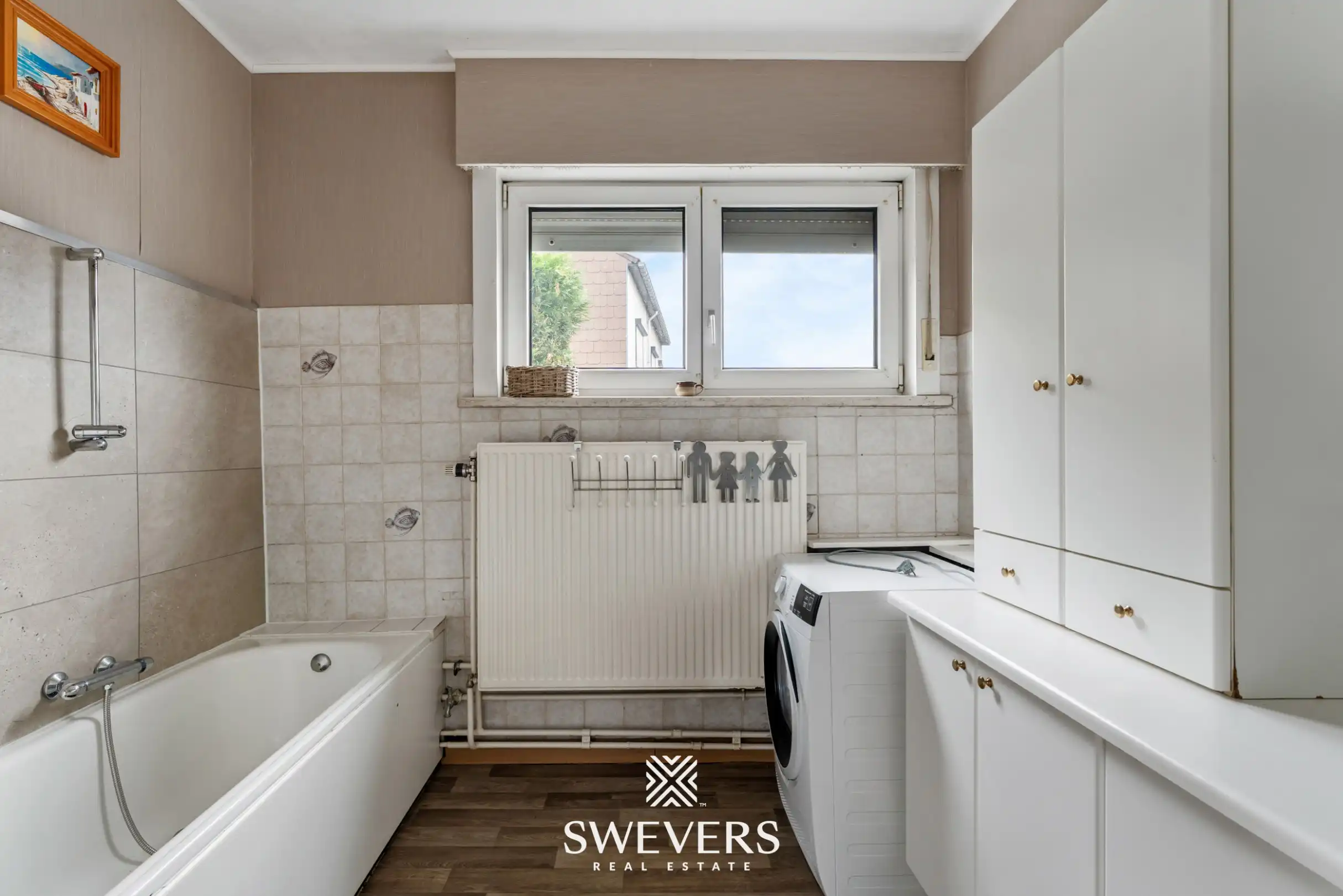 Op te knappe woning met 3 ruime slaapkamers in rustige straat te Gingelom foto 19