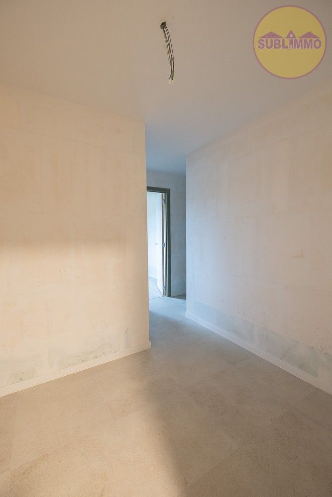 Nieuwbouwappartement op de eerste verdieping (118,50 m²) met 3 slaapkamers en terras. foto 15