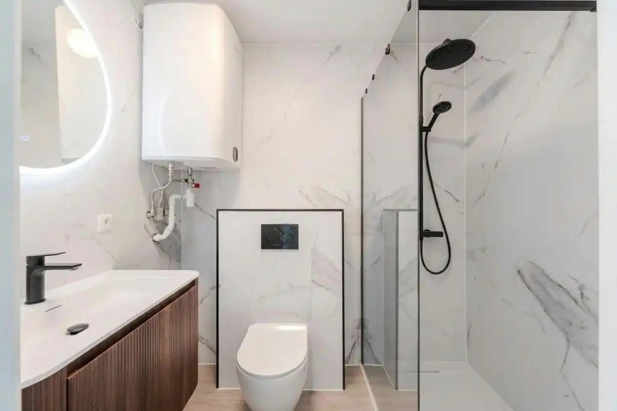 Prachtig gerenoveerd appartement te koop op rustig domein! foto 13