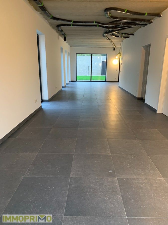 Nieuwbouw Praktijkruimte met Duplex Appartement (3 Slaapkamers) en Tuin foto 6