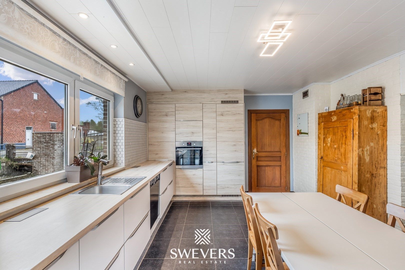 Gezellige woning met veranda, garage & zonnige tuin foto 7