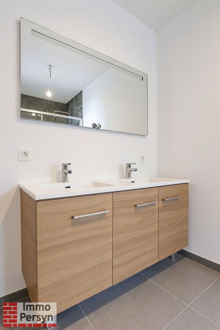 Energiezuinig nieuwbouwappartement – 1 slpk, lift & autostaanplaats foto 12